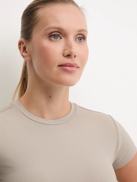 New Balance t-shirt treningowy damski kolor beżowy WT53125ADS