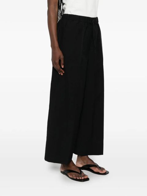 TOTEME drawstring patch-pocket trousers - Black