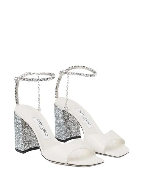 Jimmy Choo 85mm Saeda crystal-embellished glitter-heel sandals - White
