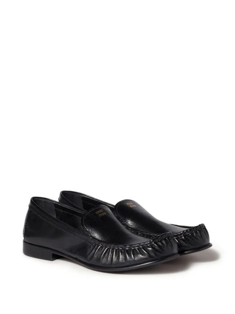 Miu Miu embossed-logo loafers - Black