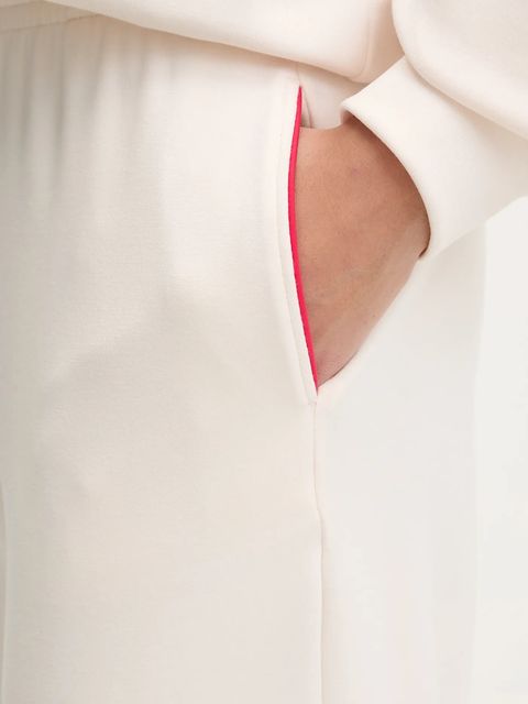 Banana Moon spodnie dresowe Welljoy damskie kolor beżowy melanżowe PLANK.WELLJOY