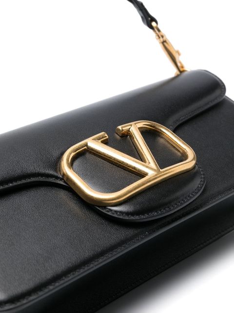 Valentino Garavani logo-plaque leather shoulder bag - Black