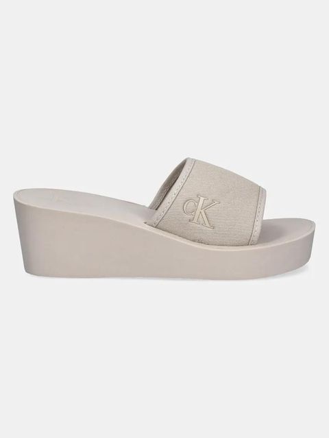 Calvin Klein Jeans klapki BEACH WEDGE SLIDE CANVAS damskie kolor beżowy na koturnie YW0YW01725