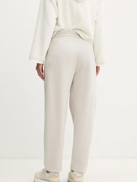 adidas spodnie dresowe Essentials kolor beżowy gładkie JD9981