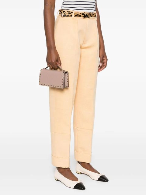 Valentino Garavani Rockstud-embellished clutch bag - Pink